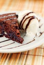 Fudge cake with vanilla ice cream Royalty Free Stock Photo