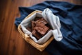 fudgy brownies in a basket lined with cloth