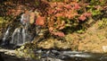 Fudo stream and the red bridge at Mount Nakano-Momiji Royalty Free Stock Photo