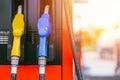 fuel gas station, closeup gasoline fuel nozzle petroleum benzine and diesel or gasohol colors type