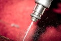 Fuel injector in action Royalty Free Stock Photo