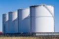 Fuel and lng gas storage tanks at oil terminal. Royalty Free Stock Photo