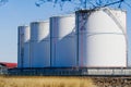 Fuel and lng gas storage tanks at oil terminal. Royalty Free Stock Photo