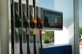 Fuel pistols at modern gas filling station