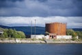 Fuel storage tank and derelict building at harbour in Greenock Royalty Free Stock Photo