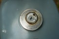 Fuel tank inlet cover with key hole of vintage grey Japanese motorcycle