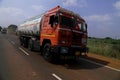 A fuel tanker on the national highway front right view