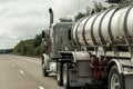 Fuel tanker track driving on mountain forest road in Canada