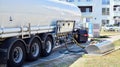 Fuel Tanker Truck at the Gas Station Shell. Refuelling a gas-station Shell