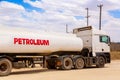 Fuel tanker truck gasoline transporter on the road. Fuel transportation concept Royalty Free Stock Photo