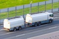 Fuel tanker truck with fuel tank trailer driving on highway Royalty Free Stock Photo
