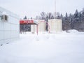 Fuel tanks at Lukoil gas stations on a winter day.