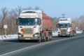 Fuel trucks passing on the winter road