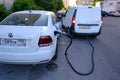 A fueling car in the process of refueling a car, the driver of which called it on the Internet