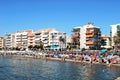 Holidaymakers relaxing on the beach, Fuengirola, Spain. Royalty Free Stock Photo