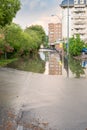 Big puddle flooding the road after a strong summer storm