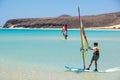 Fuerteventura , Canary island 08 June 2017 : A man is enjoying windsurfing. it is necessary to learn using a surf school Royalty Free Stock Photo