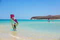 Fuerteventura , Canary island 08 June 2017 : A man is enjoying windsurfing. it is necessary to learn using a surf school Royalty Free Stock Photo