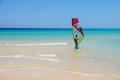 Fuerteventura , Canary island 08 June 2017 : A man is enjoying windsurfing. it is necessary to learn using a surf school Royalty Free Stock Photo