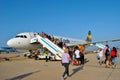 Passengers embarking a Thomas Cook Airbus A320 aircraft Royalty Free Stock Photo