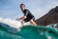 Fuerteventura - September 29, 2019: surfer riding waves on the island of fuerteventura in the Atlantic Ocean