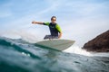Fuerteventura - September 29, 2019: surfer riding waves on the island of fuerteventura in the Atlantic Ocean