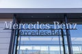 Mercedes-Benz logo hangs on a car dealer building Royalty Free Stock Photo