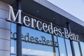 Mercedes-Benz logo hangs on a car dealer building Royalty Free Stock Photo