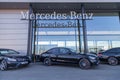 Mercedes-Benz logo hangs on a car dealer building Royalty Free Stock Photo