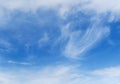 Fuffy clouds on bright blue sky background Royalty Free Stock Photo