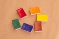 Fugural still life photo image of bright waterpaint bloks on craft paper