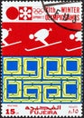 FUJAIRAH EMIRATE - CIRCA 1972: A stamp printed in United Arab Emirates shows Downhill skier, circa 1972.