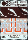 FUJAIRAH EMIRATE - CIRCA 1972: A stamp printed in United Arab Emirates shows Ski jumping, circa 1972.