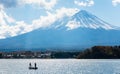 fuji mountain with fishing boat and shimmer of sunlight reflecion. Royalty Free Stock Photo