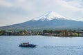 Fuji Mountain Kawaguchiko Lake view with tourist boat Japan Landmark Royalty Free Stock Photo