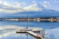 Fuji Mountain Reflection and Yacht Pier in Winter Cloudy Day at Kawaguchiko Lake, Japan Royalty Free Stock Photo