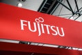 Fujitsu company logo sign on exhibition fair Cebit 2017 in Hannover Messe, Germany