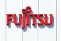 Fujitsu logo on a wall