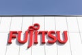 Fujitsu logo on a wall