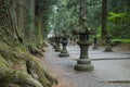 Fujiyoshida Sengen Shrine by a long approach lined by stone lanterns