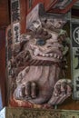 Senjafuda votive slips and Shishi Lion Nosing wooden carved guardian of Kitaguchi Hongu Fuji Sengen Jinja shinto shrine.