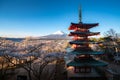 Fujiyoshida, Japan at Chureito Pagoda and Mt. Fuji in the spring with cherry blossoms full bloom during sunrise. Travel and Royalty Free Stock Photo