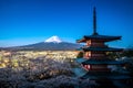 Fujiyoshida, Japan at Chureito Pagoda and Mt. Fuji in the spring with cherry blossoms full bloom during twilight. Japan Landscape Royalty Free Stock Photo