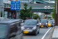 Cars stuck in traffic on the streets of Fukuoka, Japan on the evening