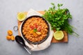 Ful Medames or Fava Beans in black bowl at grey backdrop. Foul Mudammas is a Egyptiancuisine breakfast dish Royalty Free Stock Photo