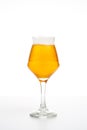 Full beer glass of pale lager of pils on white background Royalty Free Stock Photo