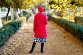 Unrecognizable stylish woman in an urban park Royalty Free Stock Photo