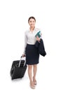 Full body business woman traveling with suitcase and holding pas Royalty Free Stock Photo