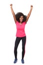 Full body happy young african american sports woman cheering with arms raised up
