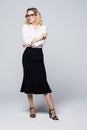Full body happy young business woman standing on white bakground Royalty Free Stock Photo